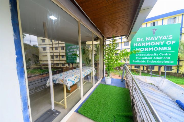Glass-front clinic entrance and balcony at Harmony of Hormones